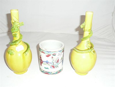 Lot 317 - Pair of Chinese yellow glazed bottle vases and a Chinese famille rose brush pot circa 1900