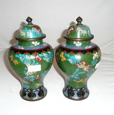 Lot 322 - A pair of 20th century cloisonne vases and covers