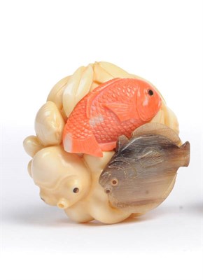 Lot 184 - A Japanese Carved Ivory and Mixed Material Netsuke, circa 1950-60, carved as an octopus...