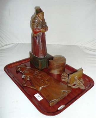 Lot 343 - Carving of a welsh lady and wall mounted carving of Mother Shipton etc