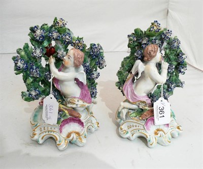 Lot 361 - Pair of 18th century English porcelain bocage figures of cherubs with a quiver of arrows