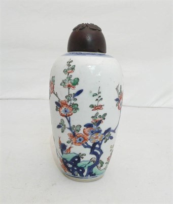 Lot 363 - A Kangxi ovoid jar and wood cover