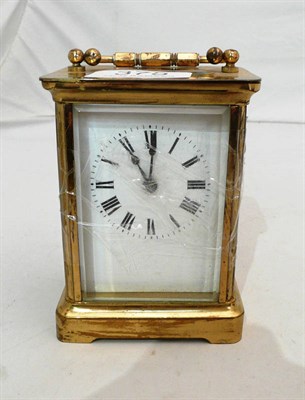 Lot 375 - Brass cased carriage clock and key