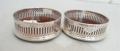 Lot 377 - Pair of silver coasters