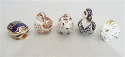 Lot 384 - Five assorted small Royal Crown Derby paperweights