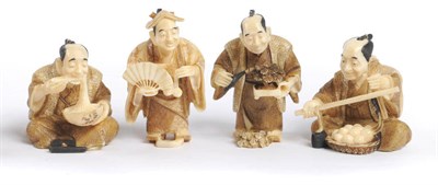 Lot 189 - A Group of Four Japanese Carved Ivory Figural Netsukes, circa 1950-60, two carved as seated...