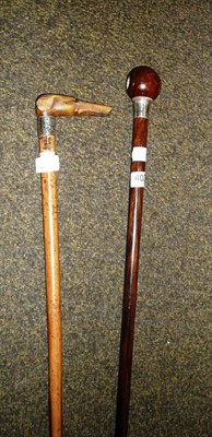 Lot 402 - Horn handled walking stick carved as a hounds head with silver collar another walking stick mounted