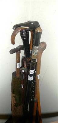 Lot 403 - Quantity of walking sticks and a sword stick