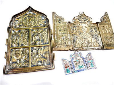 Lot 437 - Two small metal cased icons and a silver and enamel small icon (3)