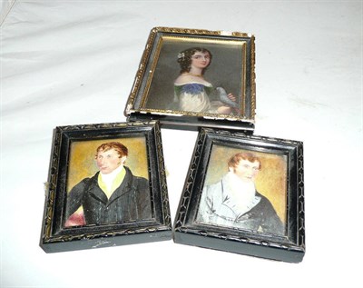 Lot 448 - Framed portrait miniature of a lady holding a parrot and two others of gents (3)