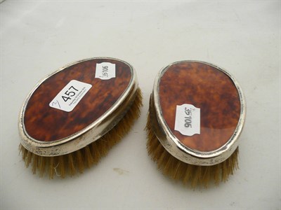 Lot 457 - Pair of silver-mounted tortoiseshell clothes brushes