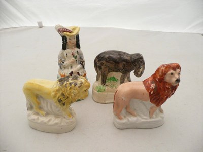 Lot 459 - Four small Staffordshire figures