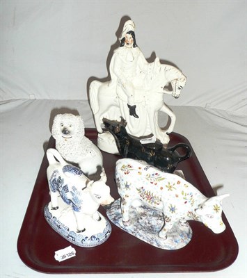 Lot 488 - Two cow creamers, Staffordshire figure and an ornament of a dog