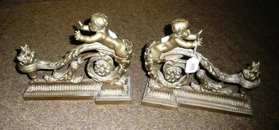 Lot 489 - Pair of figural brass fire dogs