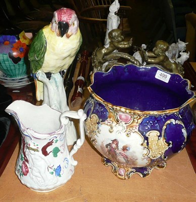 Lot 499 - A Staffordshire pottery blue glazed jardiniere, a tin-glazed Continental parrot and a Staffordshire