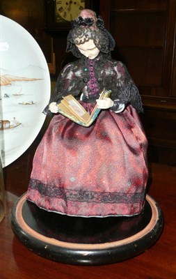 Lot 508 - Fabric doll under glass dome