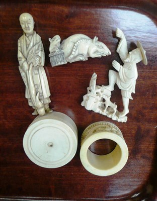 Lot 548 - A Chinese ivory figure, another, a netsuke, a napkin ring and a small ivory box