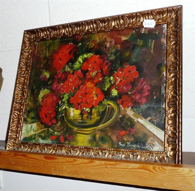 Lot 570 - Gilt framed oil on canvas, red geraniums in a jug, indistinctly signed