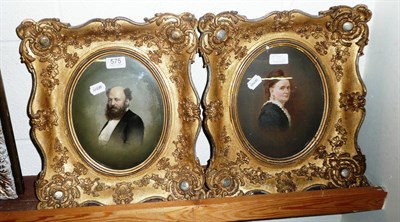 Lot 575 - Pair of gilt-framed over-painted photograph portraits