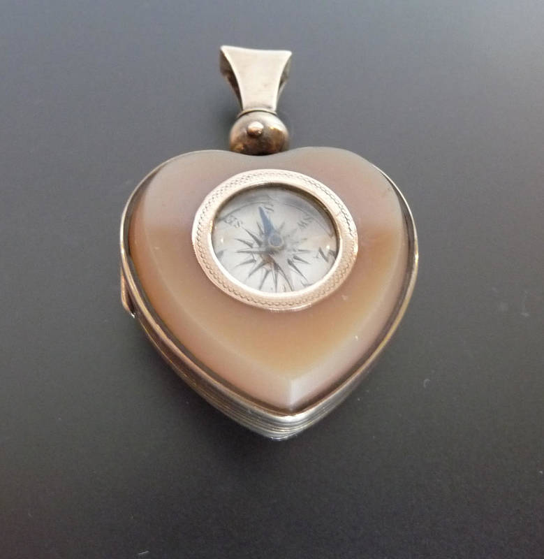 Lot 211 - A Heart Shaped Compass Locket Pendant, an agate inset with a compass to one side, and a...