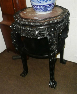 Lot 624 - Chinese hardwood marble-inset urn stand