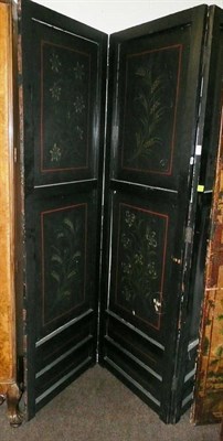 Lot 630 - A leather painted three fold screen