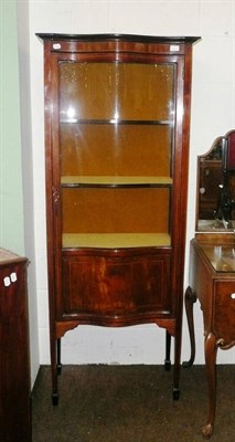 Lot 632 - Pair of Edwardian inlaid mahogany serpentine-fronted display cabinets