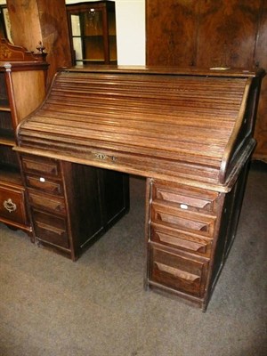 Lot 640 - Oak roll top desk