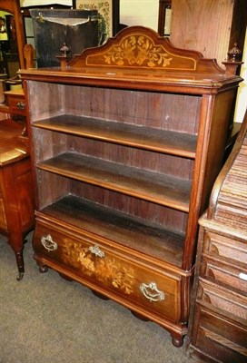 Lot 641 - A walnut inlaid open bookcase