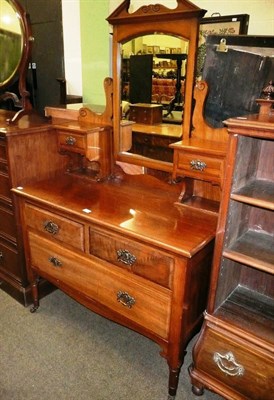 Lot 642 - A walnut dressing table