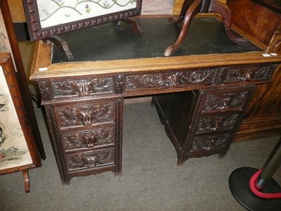 Lot 655 - Carved oak pedestal desk