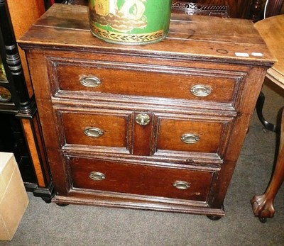 Lot 667 - A 19th century small oak chest with four drawers (converted)