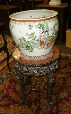 Lot 675 - A modern Chinese fish bowl on wood stand