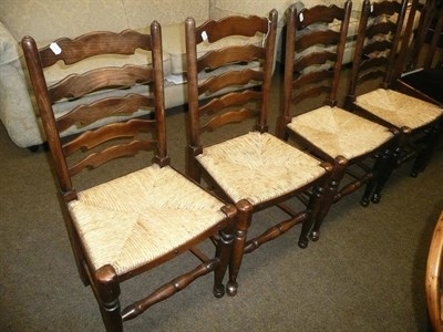 Lot 685 - Four ladder-back dining chairs