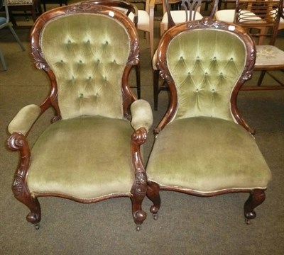 Lot 696 - A Victorian open armchair and another en-suite