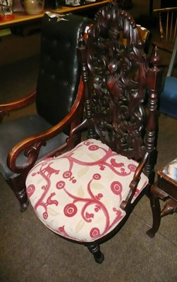 Lot 701 - Carved mahogany low chair