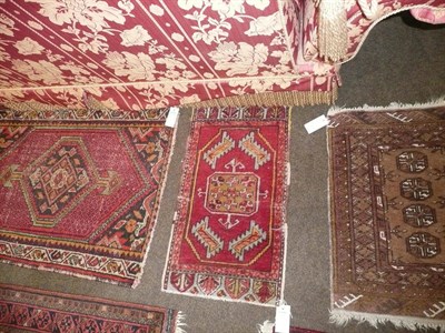 Lot 710 - Afghan rug, and six other small rugs (7)