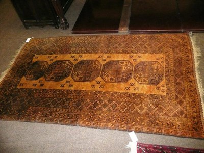 Lot 712 - Three assorted Eastern patterned rugs