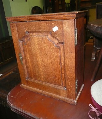 Lot 716 - A 19th century oak spice cabinet