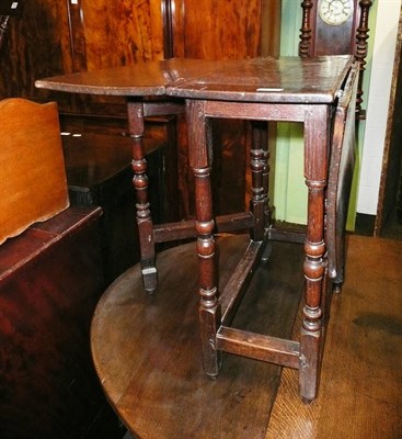 Lot 738 - An 18th century oak gateleg table