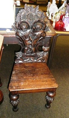 Lot 776 - A Victorian carved oak hall chair