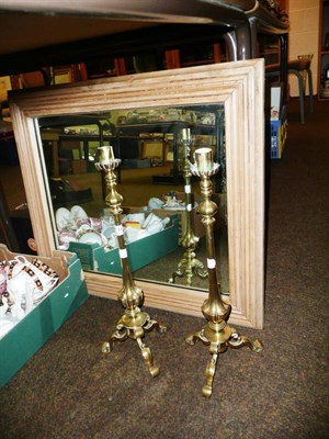 Lot 16 - A pair of candlesticks and a pine framed mirror