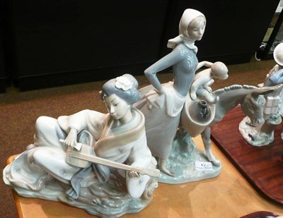 Lot 42 - A Lladro ceramics figure and a Nao figure