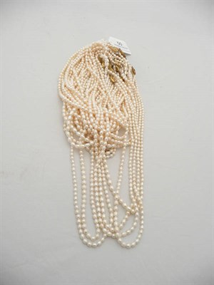 Lot 50 - Twenty-nine strands of river pearls