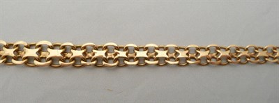 Lot 82 - A fancy link necklace stamped '18k', 17.4g approx.