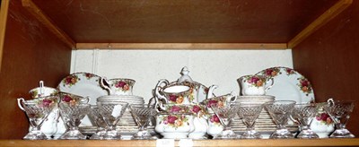 Lot 122 - Old Country Roses tea and dinner service and eleven cut glass cocktail glasses