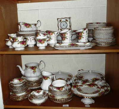 Lot 134 - A part Royal Albert "Old Country Roses" dinner service on two shelves