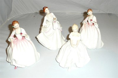 Lot 142 - A tray including four Royal Doulton figures "Tender Moment", "Heather" (a.f.), "Tender Moment"...