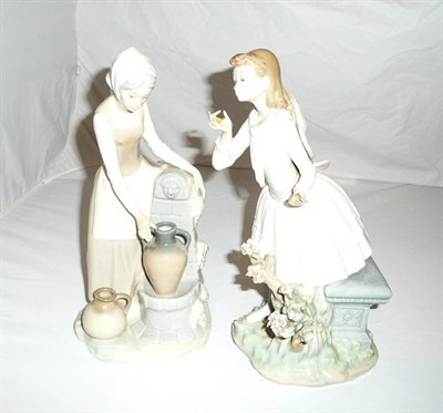 Lot 146 - A Lladro figure and a Nao figure