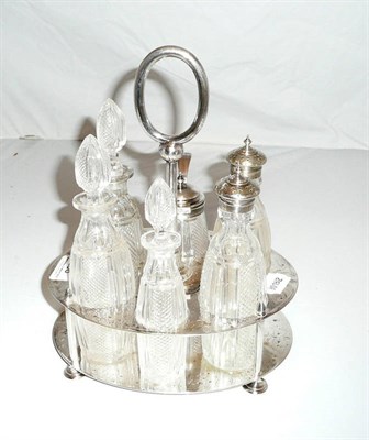 Lot 156 - Late Victorian silver plated six bottle cruet